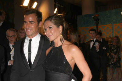 Couple Celebrity Jennifer Aniston with her brunette-colored upstyle hairstyle at the HBO Post Golden Globe Party 2015.