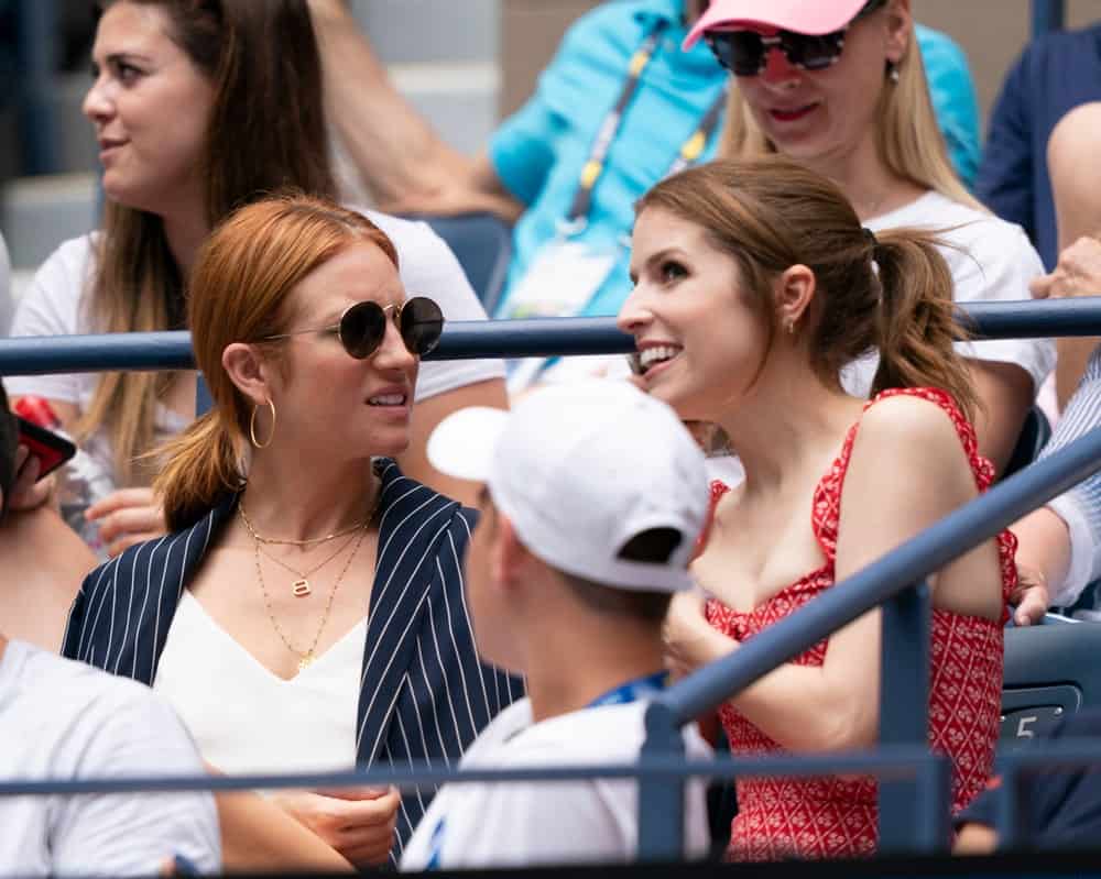 On September 1, 2019, Brittany Snow and Anna Kendrick attended the round 4 of US Open Championship at Billie Jean King National Tennis Center. Snow was seen wearing a smart casual outfit with her auburn ponytail hairstyle.
