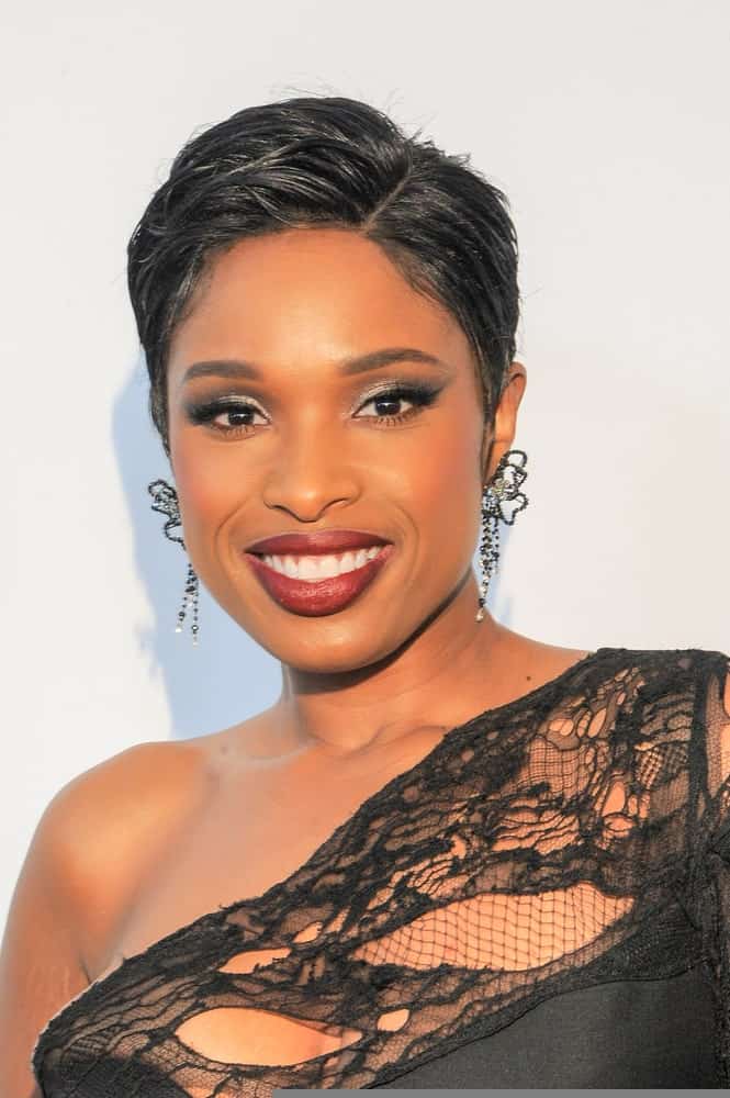 Singer Jennifer Hudson attended 'Clive Davis: The Soundtrack Of Our Lives' world premiere at Radio City Music Hall on April 19, 2017 in New York City. She was seen wearing a stunning black dress with her side-parted raven pixie hairstyle.