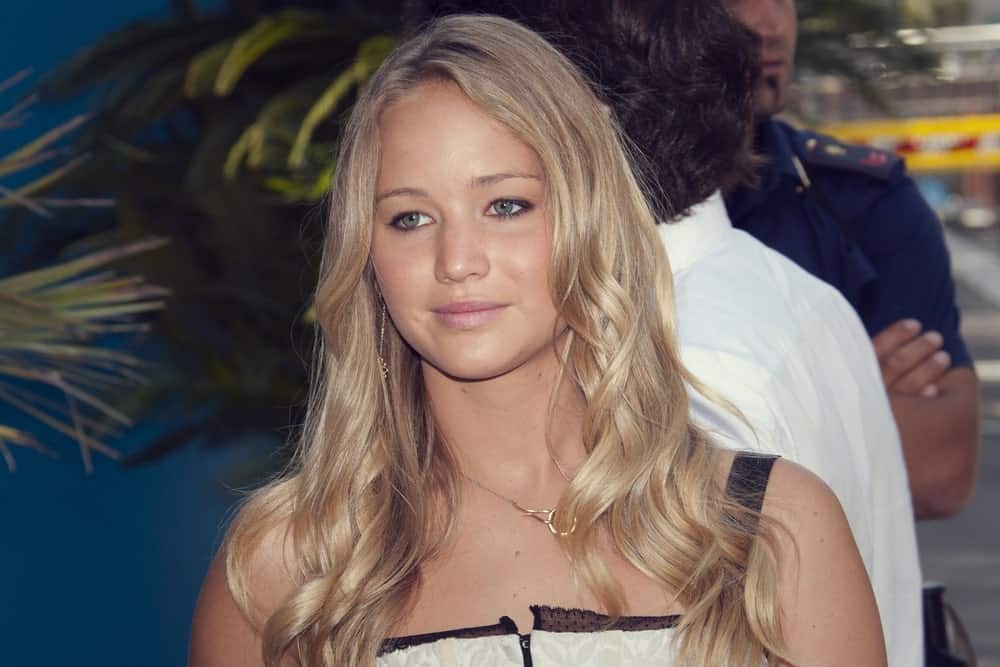 Actress Jennifer Lawrence arrived by boat at the 'The Burning Plain' photocall at the Piazzale del Casino during the 65th Venice Film Festival on August 29, 2008. Her hair was tousled, wavy and layered with a sandy blond tone.