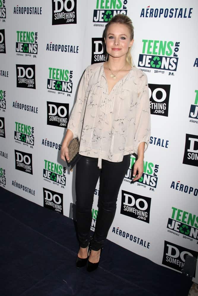 Kristen Bell was seen at the 5th Annual Teens For Jeans on January 10, 2012, at Palihouse, West Hollywood, CA. She pulled off a pompadour ponytail that goes perfectly with her casual attire.