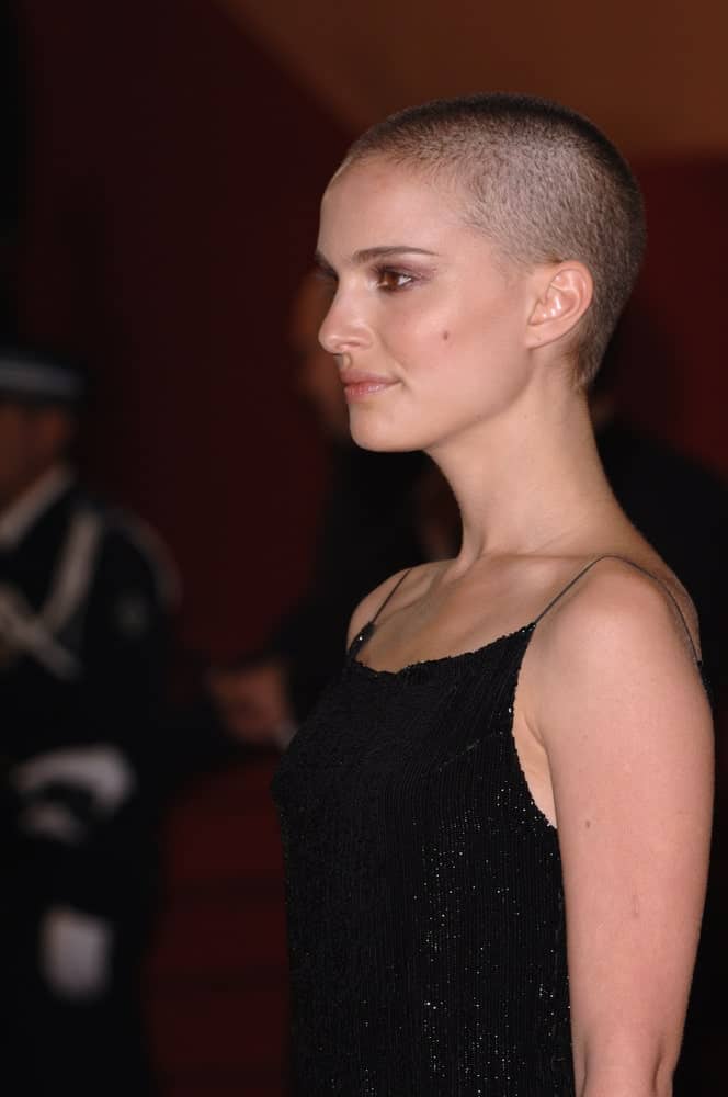 Actress Natalie Portman flaunted her beautiful facial features with a buzz cut and a simple black dress at the official screening of Kiss Kiss, Bang Bang at the 58th Annual Film Festival de Cannes on May 14, 2005 in Cannes, France.