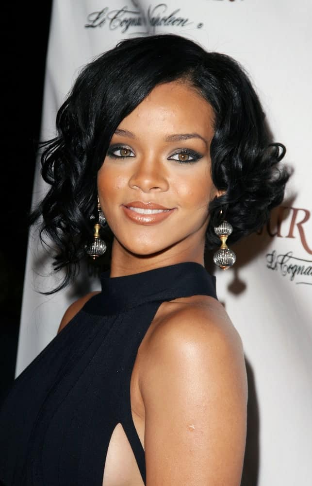 Rihanna was quite elegant with a vintage vibe to her black dress and short raven hairstyle with vintage curls at the tips when she arrived at the House of Courvoisier BET Awards After Party in Hollywood, California on June 26, 2007.