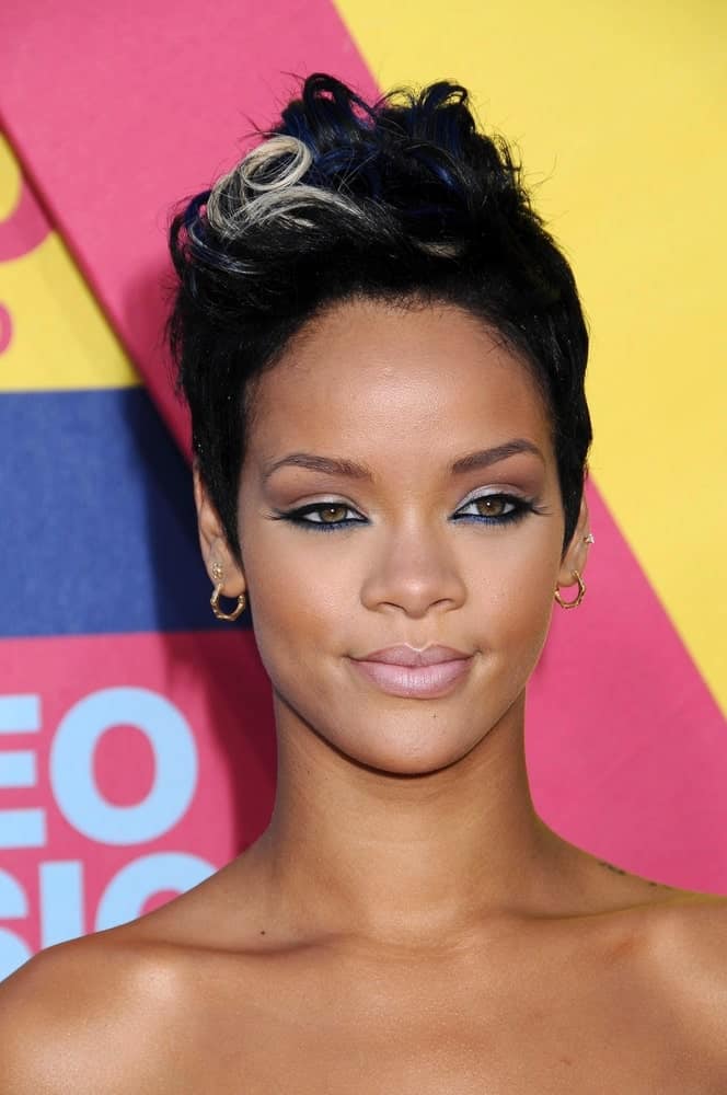 Rihanna's raven pixie hair was curly and swept up with a few tendrils highlighted at the 2008 MTV Video Music Awards at the Paramount Pictures Studios in Los Angeles, CA on September 7, 2008.