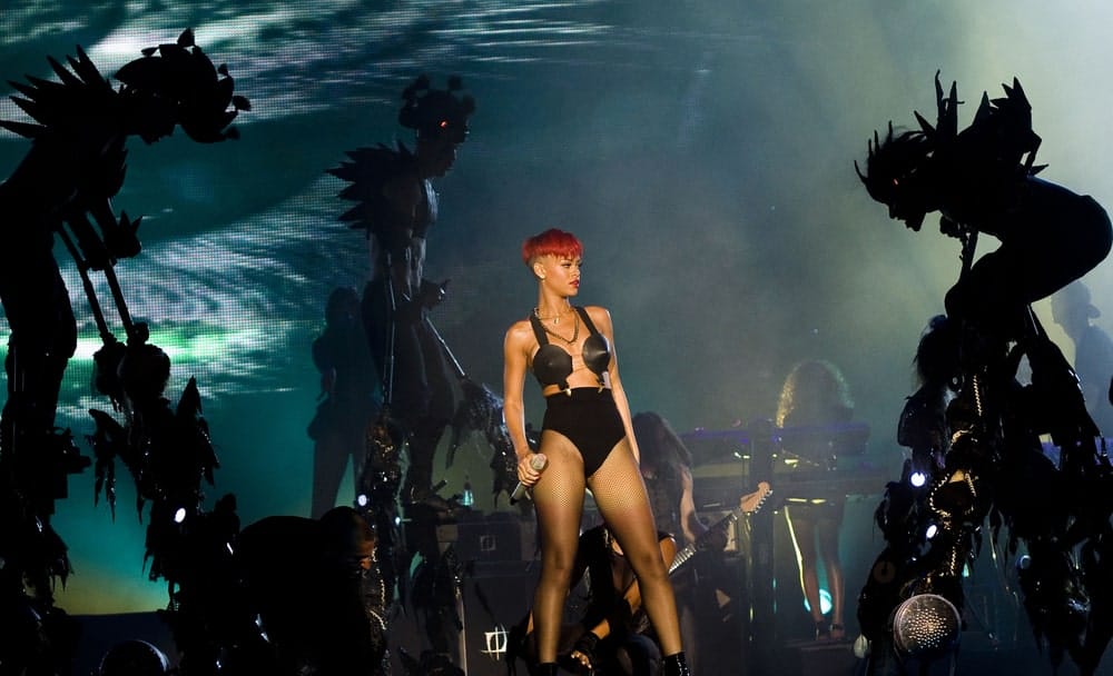 Rihanna's concert during the Rock in Rio in Arganda del Rey was on June 5, 2010 in Madrid. She was stunning and mesmerizing in her black two-piece outfit that she paired with a bright red pixie hairstyle with an undercut finish.