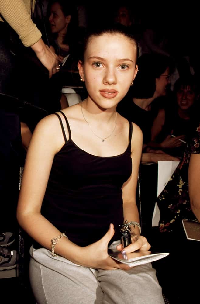 A young Scarlett Johansson attended the Betsey Johnson Show in New York on March 3 1998. She wore a casual ensemble outfit with her neat and slick ponytail.