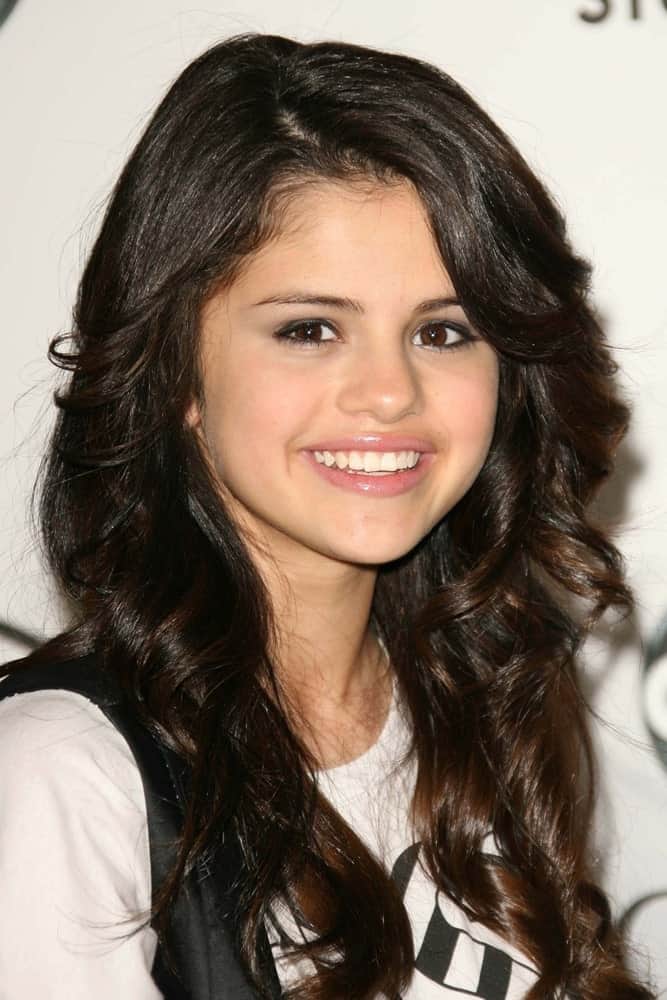 Selena Gomez was at the 2007 ABC All Star Party at the Beverly Hilton Hotel in Beverly Hills, CA on July 26, 2007. She went with a casual outfit that paired well with her lovely and long layered waves with highlights.