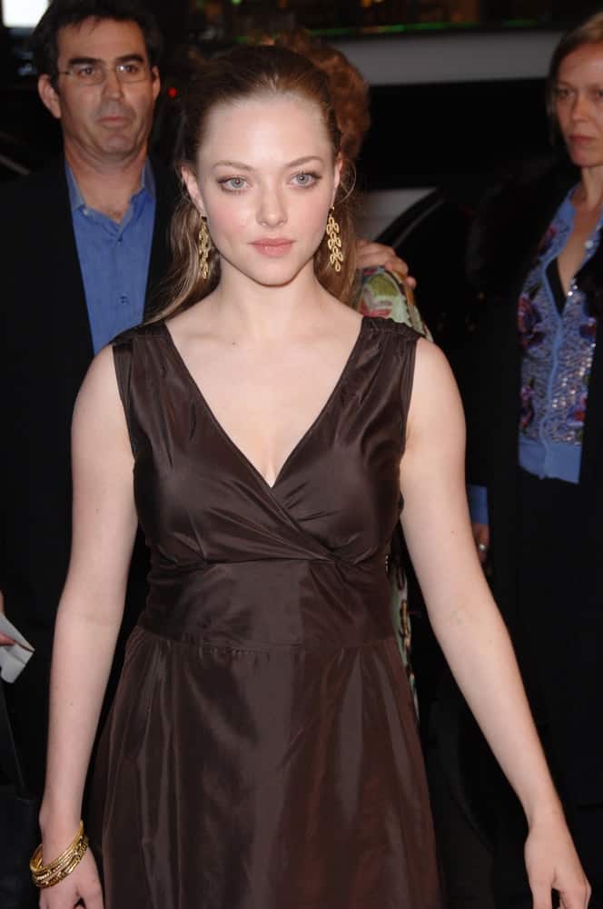 Amanda Seyfried paired her charming dark dress with a dark half-up hairstyle with a slick look at the Los Angeles premiere of her new HBO TV series, 