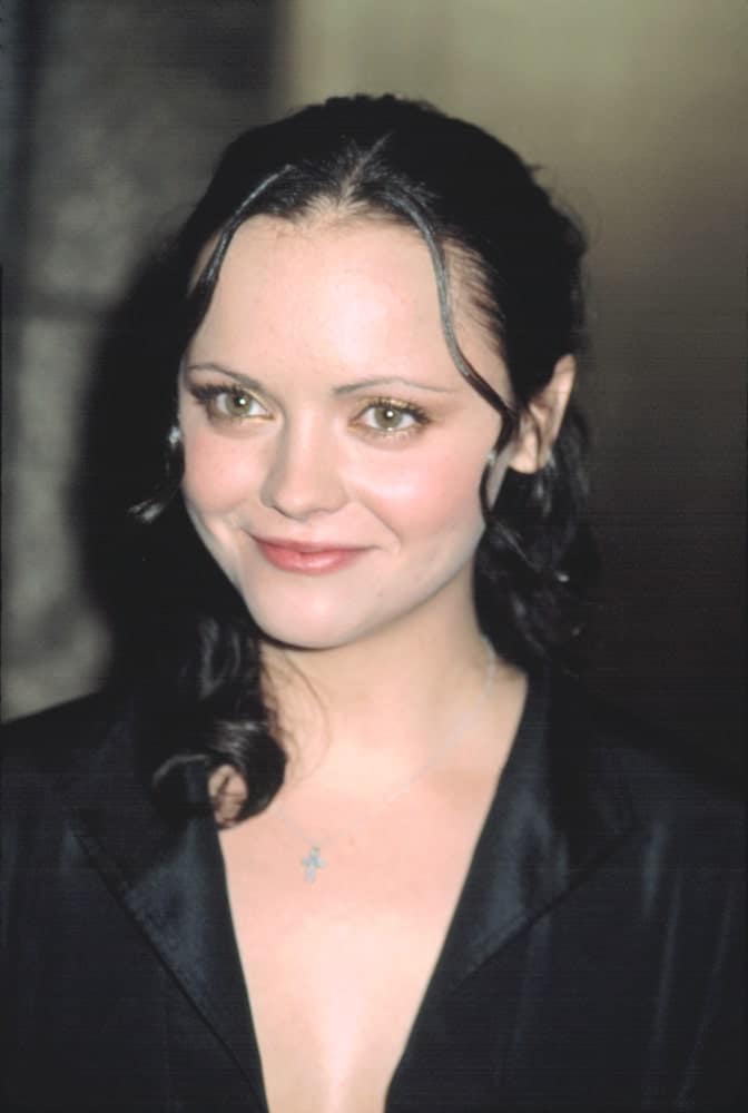 Christina Ricci attended the VH1 Vogue Fashion Awards in New York on October 15, 2002. She wore an all-black outfit with her curly raven ponytail hairstyle with loose tendrils.