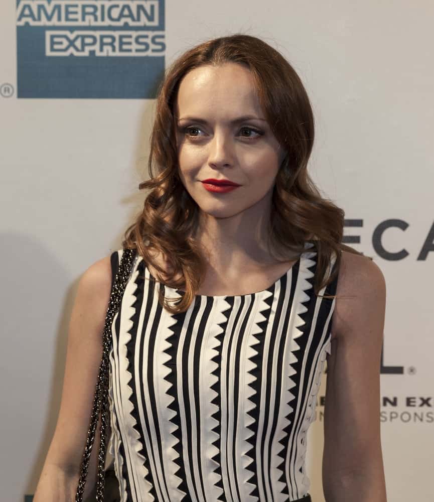 Christina Ricci attended Sneak Peek of The Smurfs 2 at the 2013 Tribeca Film festival at BMCC on April 27, 2013 in New York. She was stunning in a black and white dress that she paired with a medium-length brunette hairstyle with big curls.