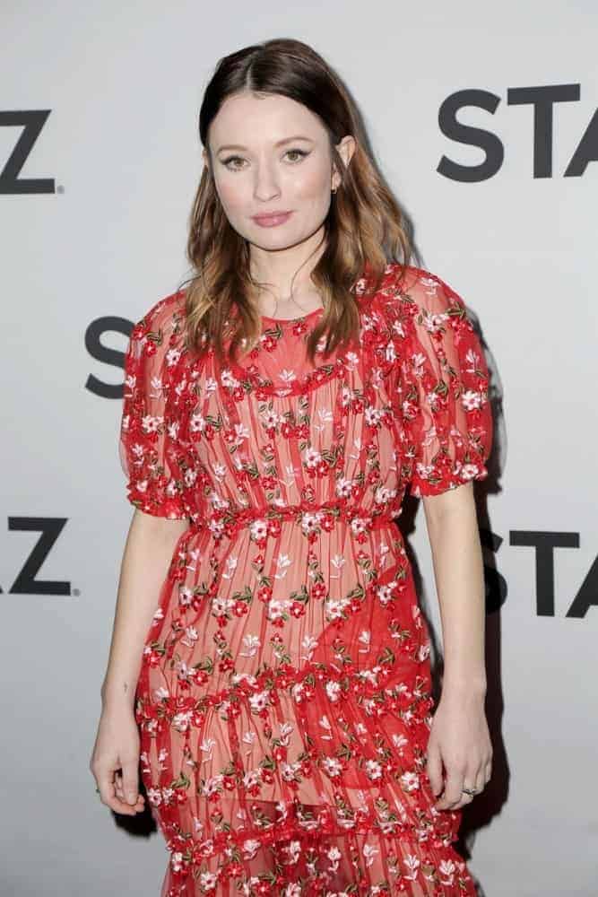 Emily Browning attended the 2019 Starz Winter TCA Event at the 71Above on February 12, 2019, in Los Angeles, CA. She was charming in a red sheer dress that pairs well with her medium-length tousled and layered brunette hairstyle.