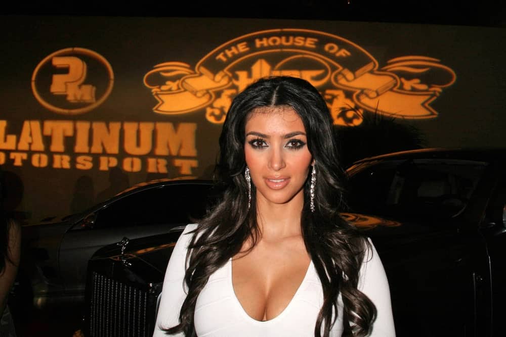 Kim Kardashian was seen with her long center-parted raven waves that contrast her white dress at the "House of Hype" Grammy Weekend 2007 on February 10, 2007.