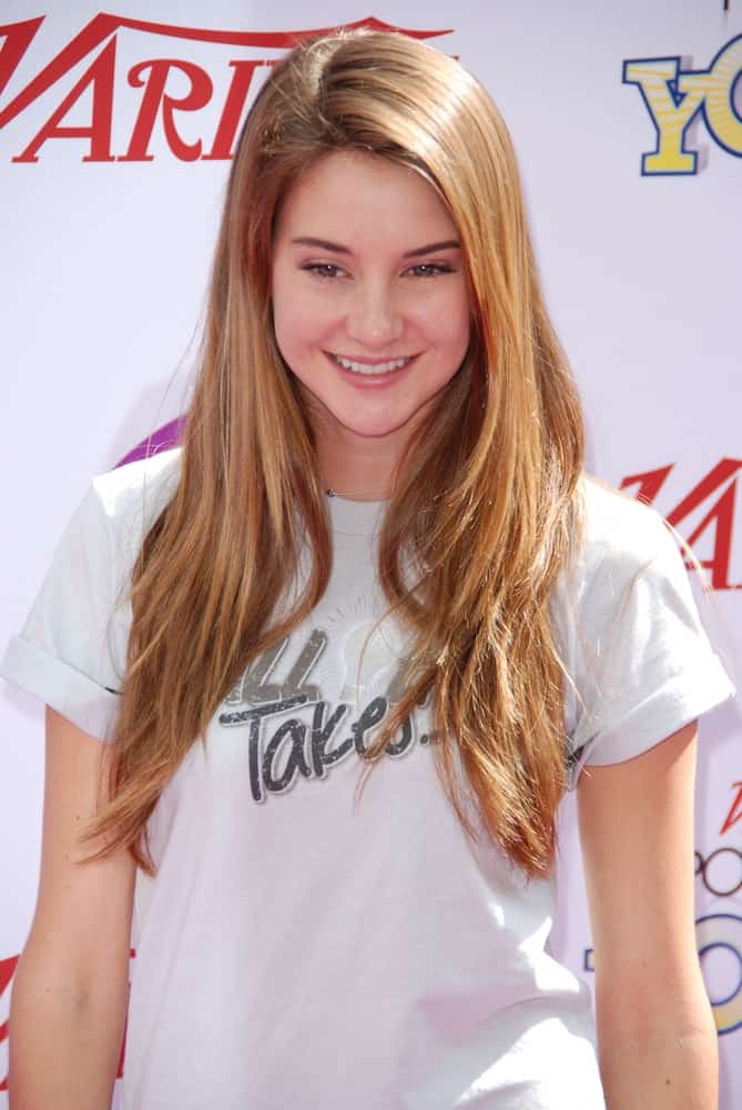Actress Shailene Woodley attended the Variety's Power of Youth event at The Paramount Studios on October 24, 2010 in Hollywood, California. She wore a casual white shirt with her light brown hair that is long, layered, loose and tousled.