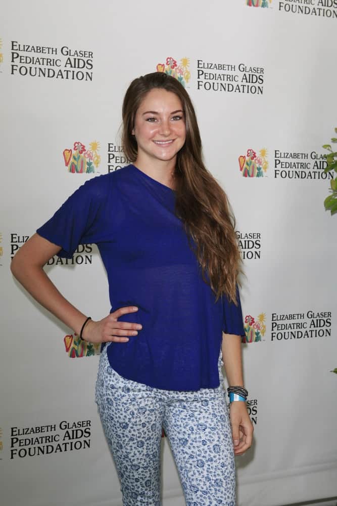 Shailene Woodley was at the 23rd Annual 'A Time for Heroes' Celebrity Picnic Benefitting the Elizabeth Glaser Pediatric AIDS Foundation on June 3, 2012 in Los Angeles, California. She wore a colorful casual outfit and paired it with a long side-swept brunette hairstyle that is tousled and layered.