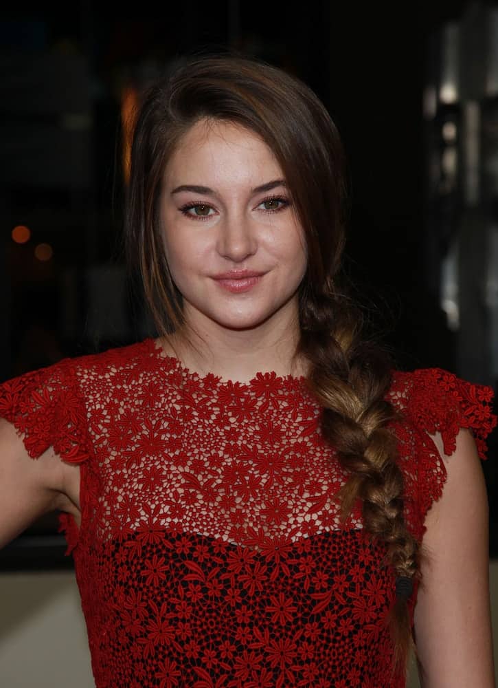Shailene woodley attended the Director's Guild Awards 2012 on January 28, 2012 in Hollywood, CA. She wore an embroidered red floral dress that topped it with a brunette side-swept hairstyle that has a fishtail braid.