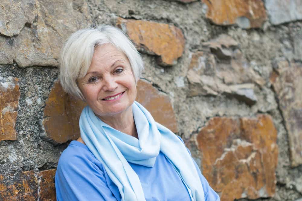Woman with short white hair