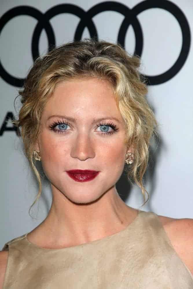 Brittany Snow attended the Audi And Derek Lam Kick Off Emmy Week 2012, Cecconi's, West Hollywood, CA on September 16, 2012. She wore a charming beige dress with her messy and curly sandy blonde bun hairstyle.