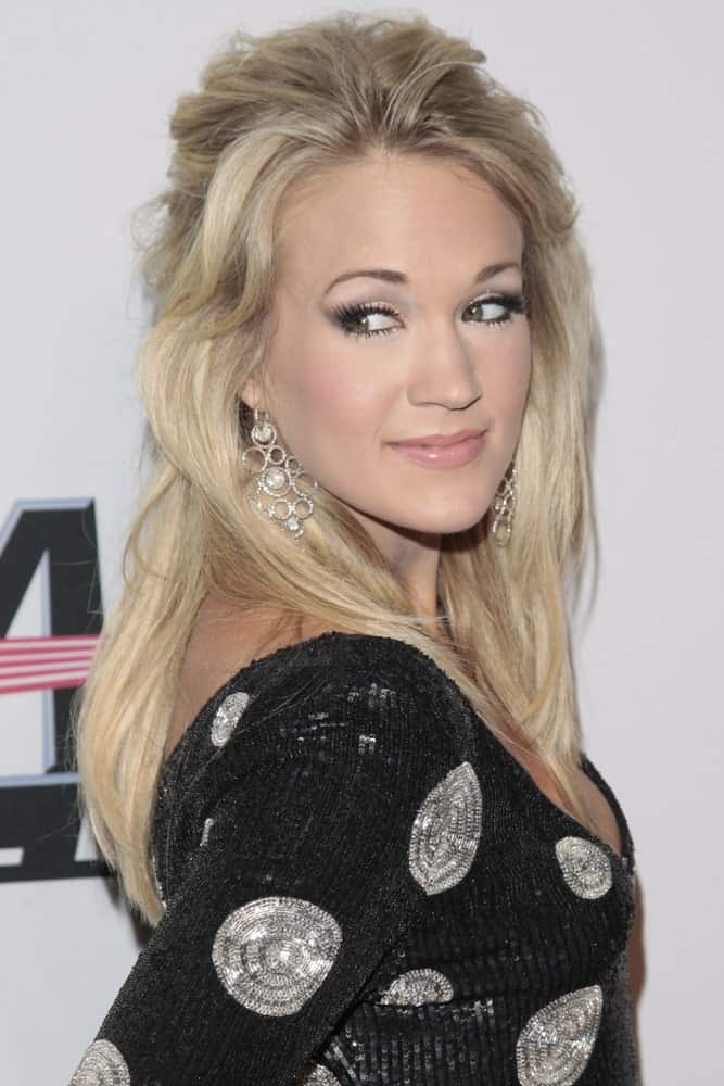 Carrie Underwood rocked a tousled half-up hairstyle at the Clive Davis and The Recording Academy present the Annual Pre-Grammy Gala held on February 7, 2009.