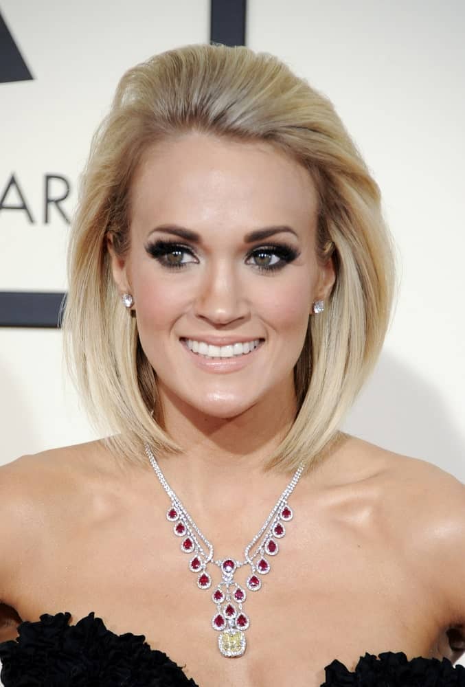 Carrie Underwood attended the 58th GRAMMY Awards at the Staples Center on February 15, 2016, in a short slicked hairstyle.
