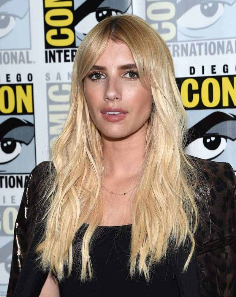 Emma Roberts attended the Comic-Con 2016 for "Scream Queens" PhotoCall on July 22, 2016, in San Diego, CA. She was seen wearing an all-black leather outfit with her long and tousled blonde layers.