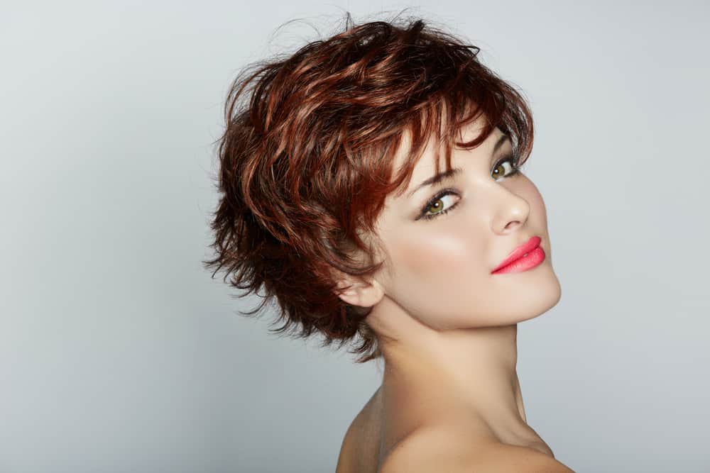 Example of woman with layered bangs.