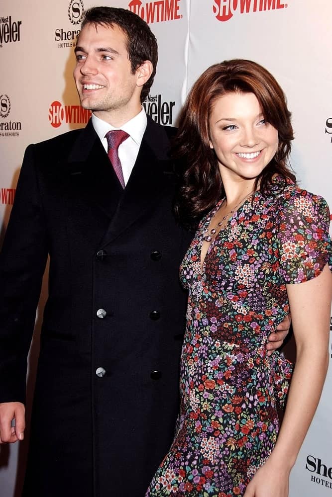 Natalie Dormer with Henry Cavill arriving for the Showtime Hosts World Premiere Screening of THE TUDORS Season 2 held at Sheraton New York Hotel & Towers on March 19, 2008. The actress opted for a brunette wavy hairstyle that she paired with a lovely floral dress.