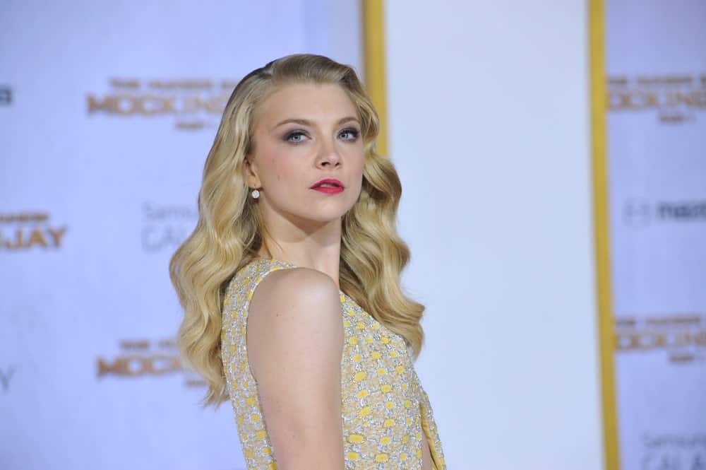 Natalie Dormer with her flowing blonde waves at the Los Angeles premiere of her movie "The Hunger Games: Mockingjay Part One" held on November 17, 2014.