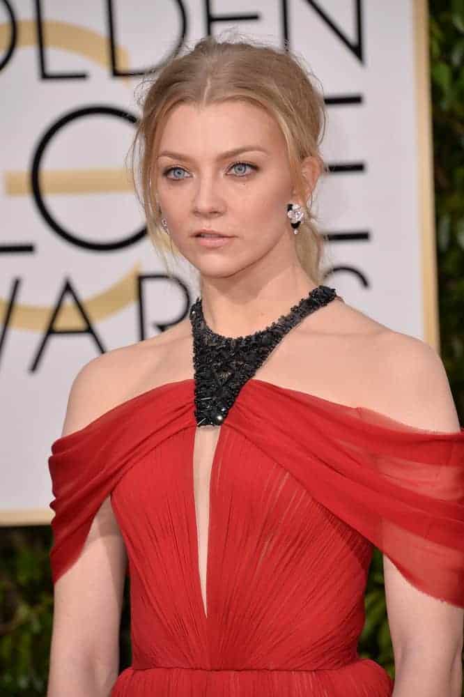 Natalie Dormer opted for a messy-hair-don't-care vibe with this messy ponytail waves hairstyle with a few center-part pieces framing her face at the 73rd Annual Golden Globe Awards on January 10, 2016.