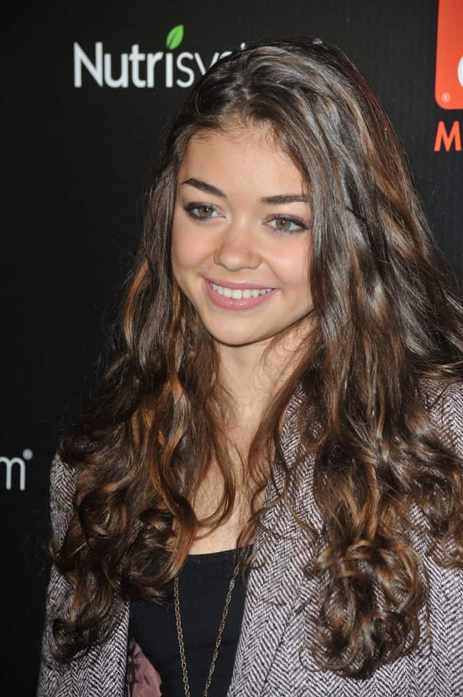 Sarah Hyland was at the TV Guide Magazine's Hot List Party at the SLS Hotel, Beverly Hills on November 10, 2009. She wore a gray jacket to pair with her long and loose tousled curly hairstyle with layers.