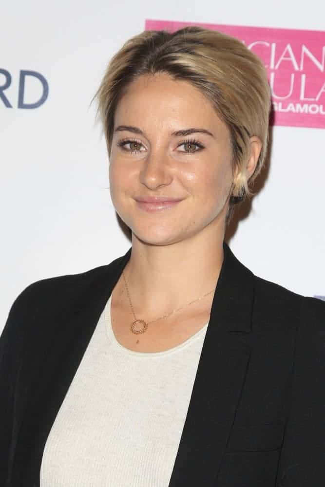 Shailene Woodley was at the "White Bird in a Blizzard" LA Premiere at Arclight Hollywood on October 21, 2014, in Los Angeles, CA. She was seen wearing a smart casual outfit with her highlighted blonde pixie hairstyle.