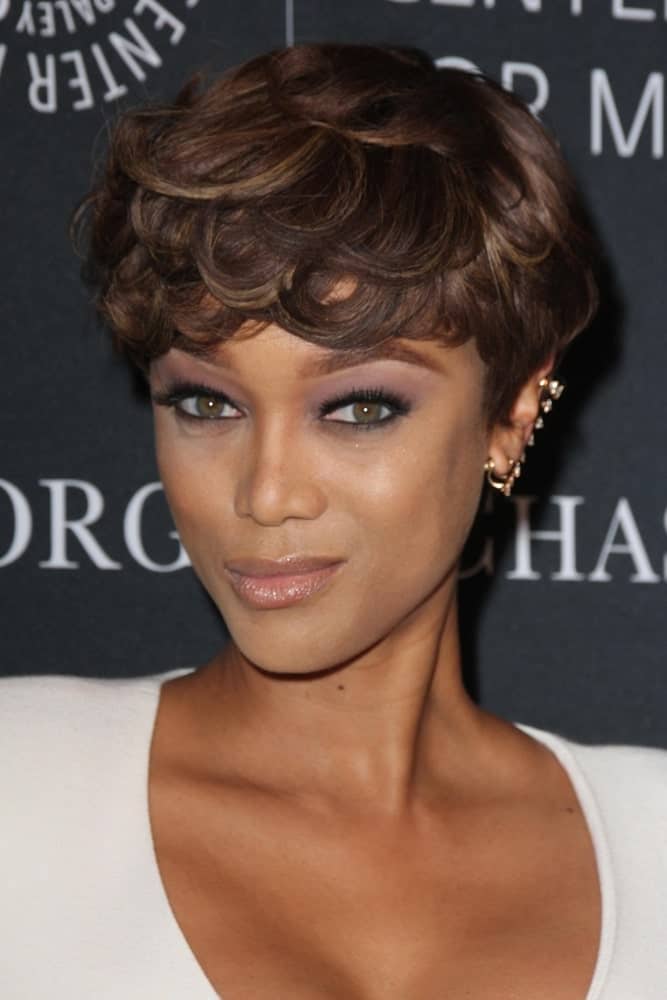 Tyra Banks' beautiful pixie hairstyle was curly and tousled perfectly at the Paley Center's Hollywood Tribute to African-Americans in TV at the Beverly Wilshire Hotel on October 26, 2015 in Beverly Hills, CA.