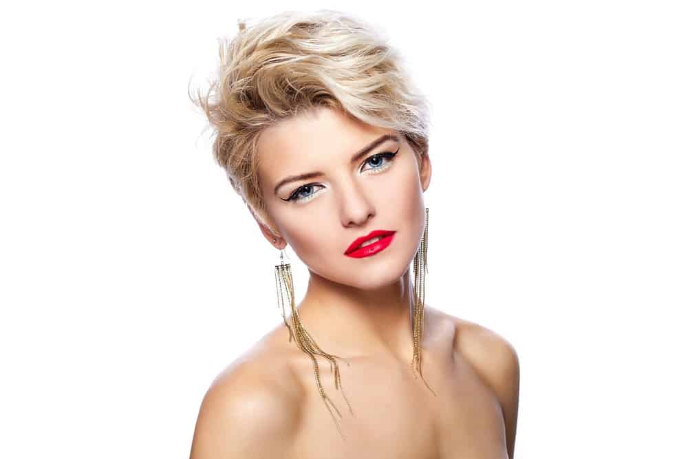 Example of woman with feathered bangs.