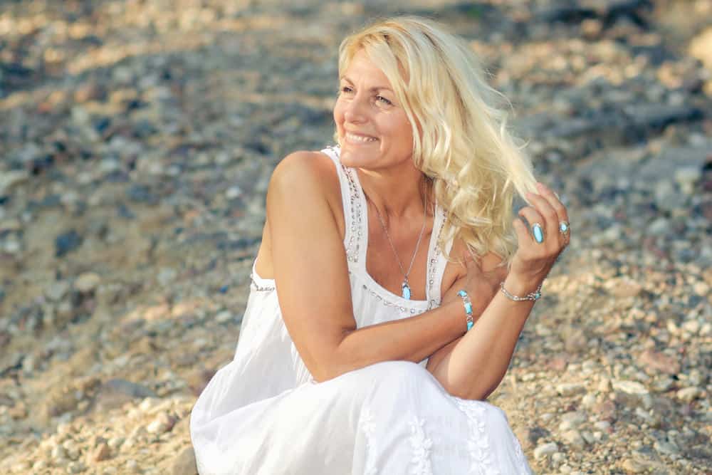 Older woman with blonde wavy hair