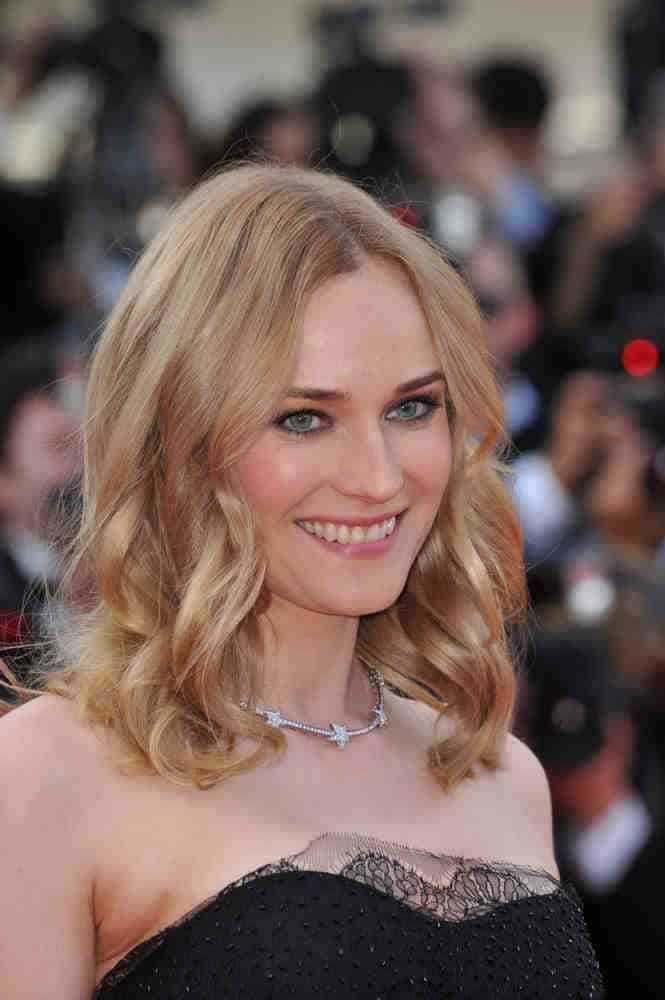 The German-American beauty showed some charm with her loose beachy waves for her medium-length locks at the 63rd closing Awards Gala on May 23, 2010. The German-American beauty showed some charm with her loose beachy waves for her medium-length locks at the 63rd closing Awards Gala on May 23, 2010.