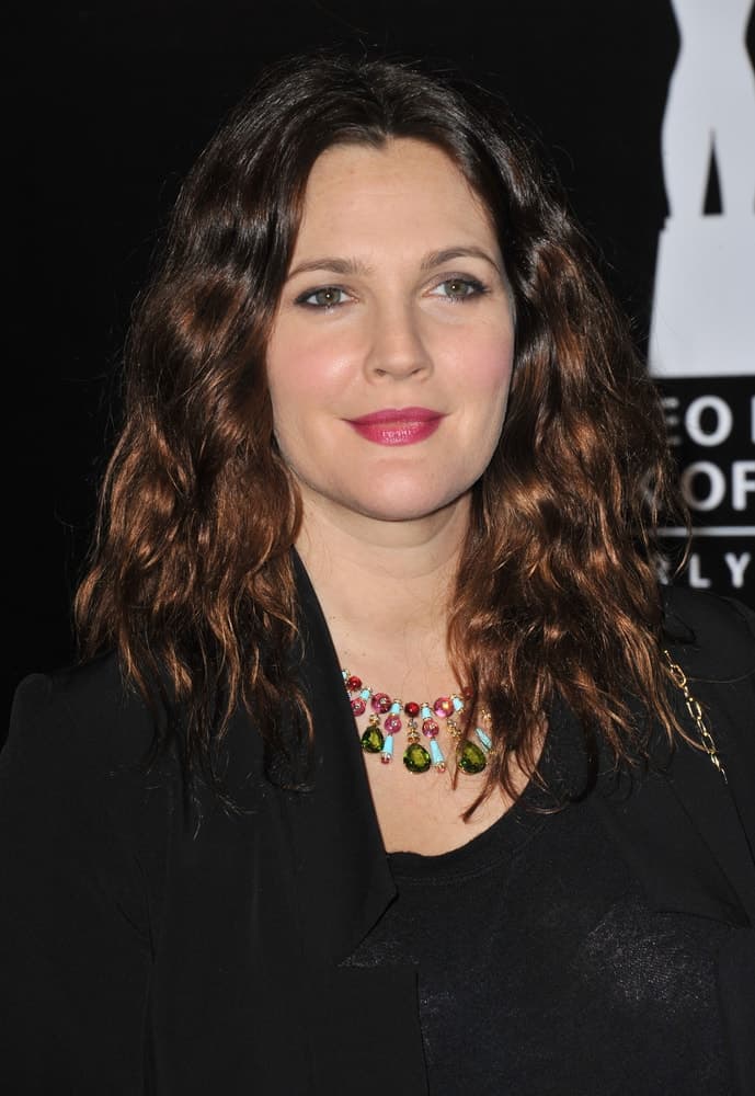 This medium-length loose locks style with beachy waves looked naturally gorgeous for her as she attends the 2012 Rodeo Drive Walk of Style Gala on December 5, 2012. This medium-length loose locks style with beachy waves looked naturally gorgeous for her as she attends the 2012 Rodeo Drive Walk of Style Gala on December 5, 2012.