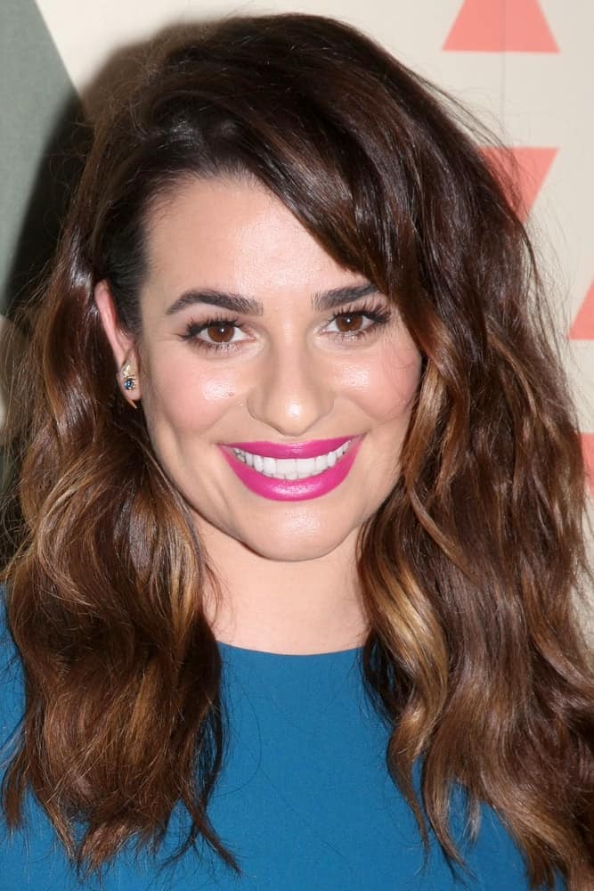 Lea Michele was edgy-glam wearing this tousled hairstyle with side-swept bangs at the FOX Summer TCA All-Star Party 2015 on August 6, 2015. Lea Michele was edgy-glam wearing this tousled hairstyle with side-swept bangs at the FOX Summer TCA All-Star Party 2015 on August 6, 2015.