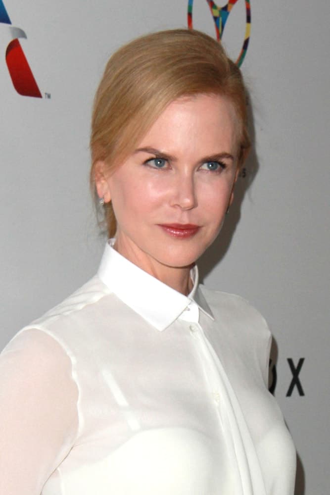 Kidman kept a simple yet classy vibe in a deep side-parted low ponytail with side-swept bangs as she attends the 3rd "Gold Meets Golden" on February 21, 2015. Kidman kept a simple yet classy vibe in a deep side-parted low ponytail with side-swept bangs as she attends the 3rd "Gold Meets Golden" on February 21, 2015.