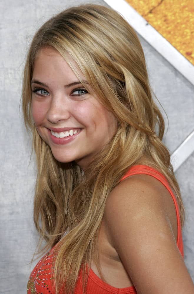 Ashley Benson was at the Los Angeles premiere of 'Step Up' held at the Arclight Cinemas in Hollywood on August 7, 2006. She wore a casual orange outfit with her tousled long sandy blonde hair with layers and highlights.
