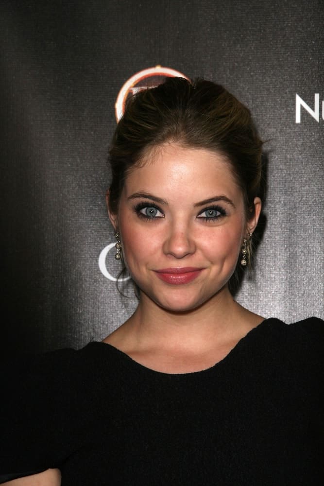 Ashley Benson was at the TV Guide Magazine's "2010 Hot List," in Drai's, Hollywood, CA on November 8, 2010. She came in a black dress that went well with her dyed dark brown bun hairstyle with subtle highlights.