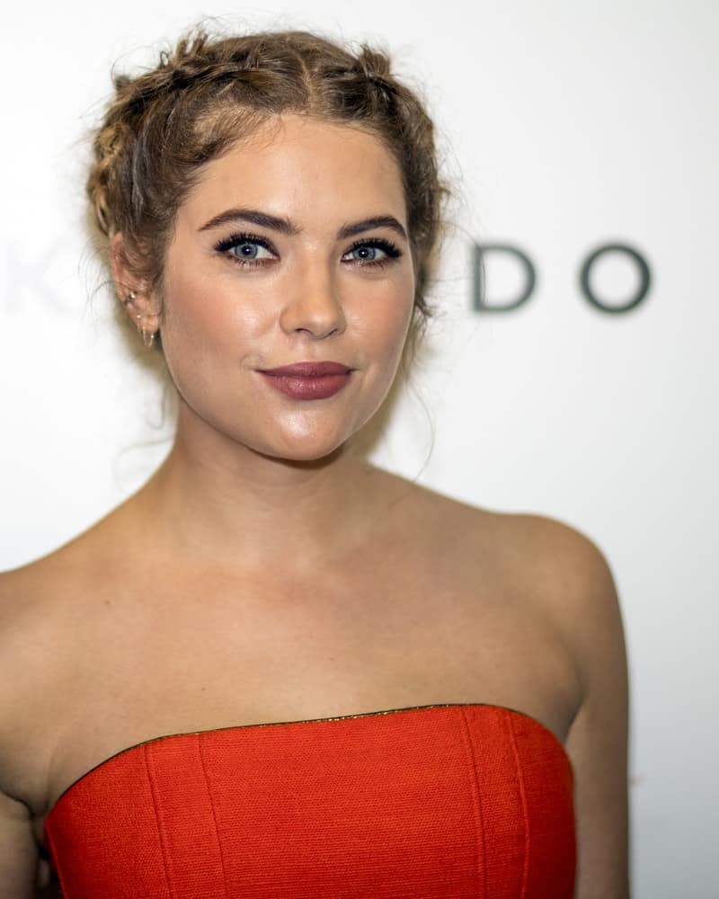Ashley Benson was at the Restaurant Komodo on January 28, 2016 in Miami, FL, for the presentation of her cover in the Magazine Ocean Drive, 23rd Anniversary Edition. She wore an orange strapless outfit with her sandy blonde braided hairstyle.
