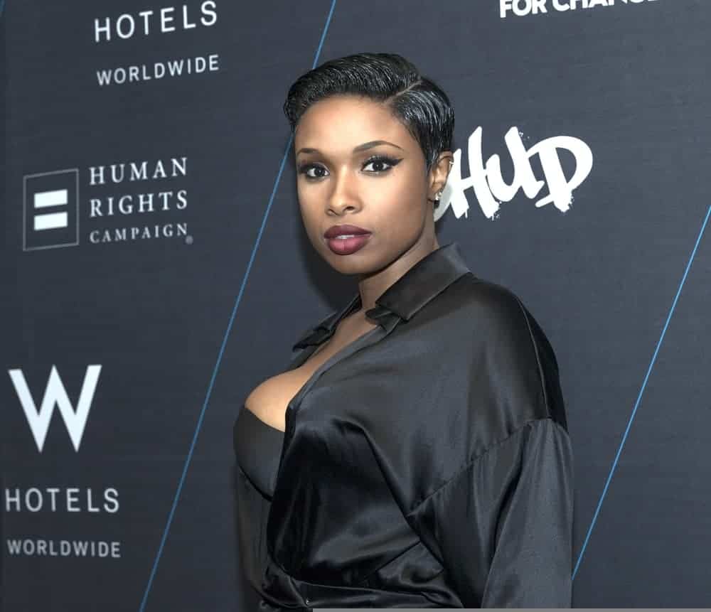 On October 21, 2014, Jennifer Hudson attended the W Hotels TURN IT UP FOR CHANGE Ball at W Union Square. She was sexy and stunning in a black outfit to match her slick side-parted raven pixie hairstyle.