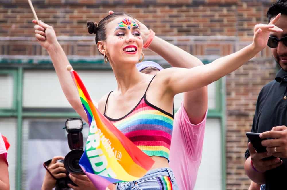 Victoria Justice attended the NYC Pride Parade 2018 in New York, NY on June 24, 2018. She wore a colorful casual outfit, colorful face paint and her hair was styled into buns.