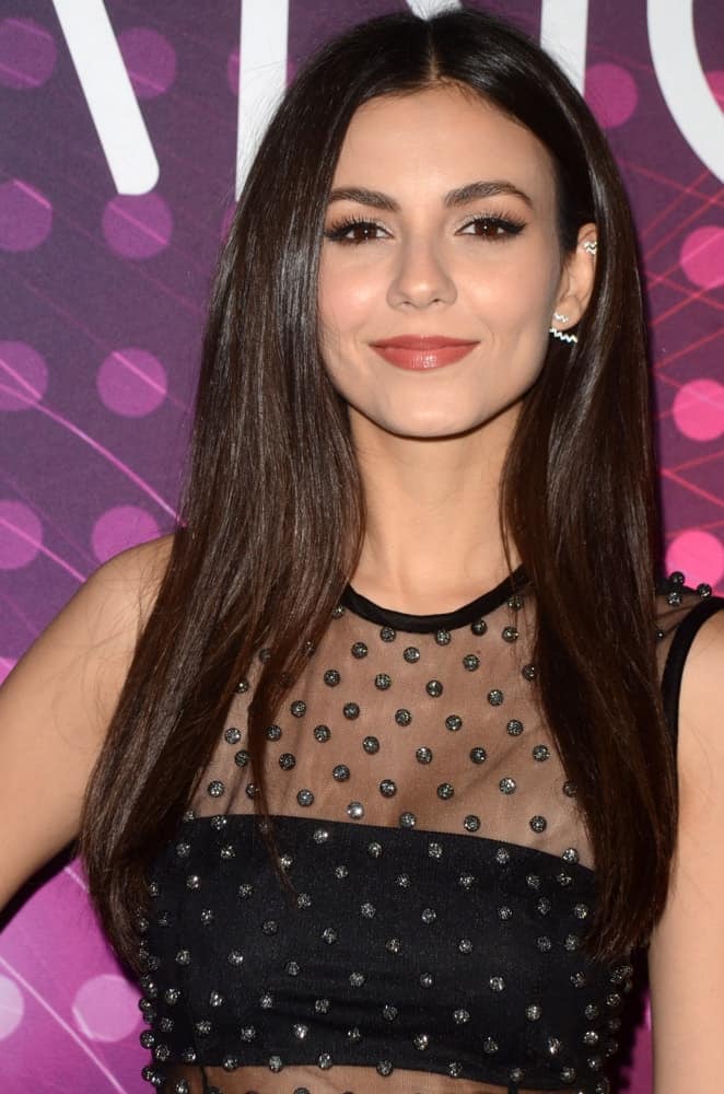 Victoria Justice attended the amfAR Dance2Cure Kickoff Event at the Bardot on December 1, 2018 in Los Angeles, CA. She paired her stunning outfit with a long and loose tousled straight brunette hairstyle with subtle layers.