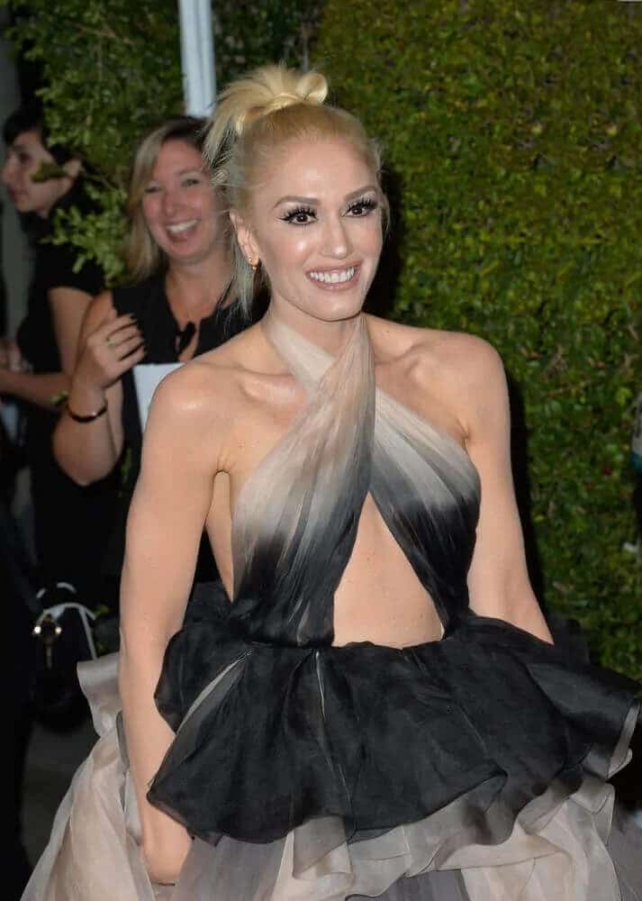 Gwen Stefani paired her stylish and sexy gown with a simple and messy top knot during the Glamour Women Of The Year 2016, November 14, 2016 in Los Angeles, CA.
