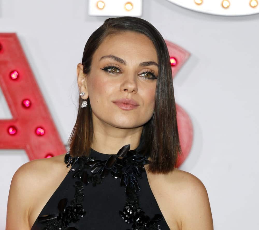 Mila Kunis was gorgeous with her black detailed dress and straight bob hairstyle with subtle highlights at the premiere of 'A Bad Moms Christmas' held at the Regency Village Theatre in Westwood last October 30, 2017.