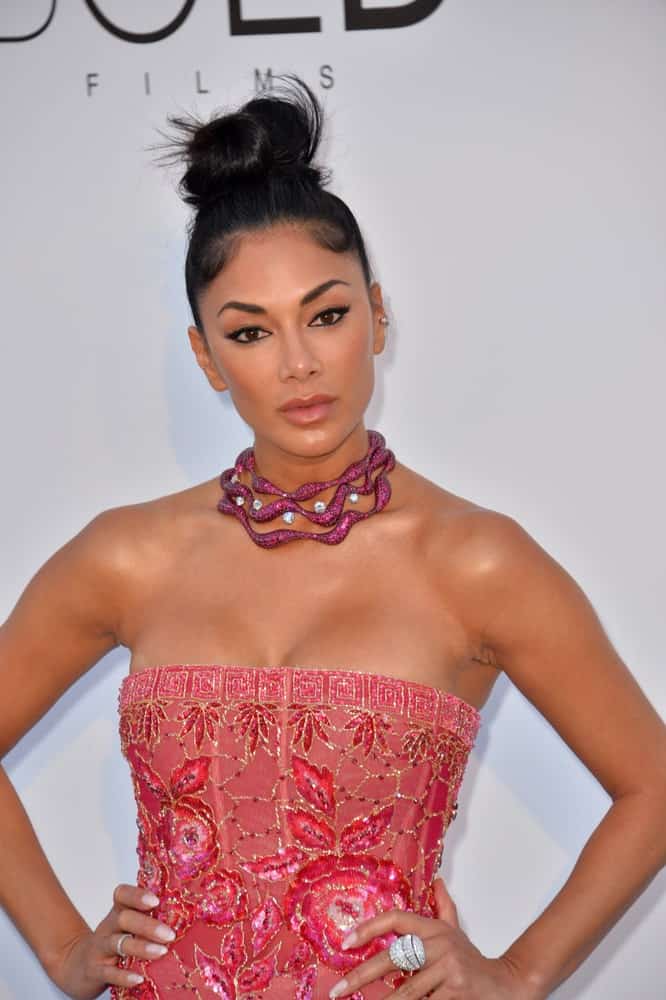 The gorgeous TV personality wore a neat high bun hairstyle flaunting a pink collar necklace that complements her floral tube dress. This was taken at the 25th amfAR Gala Cannes event last May 17, 2018.