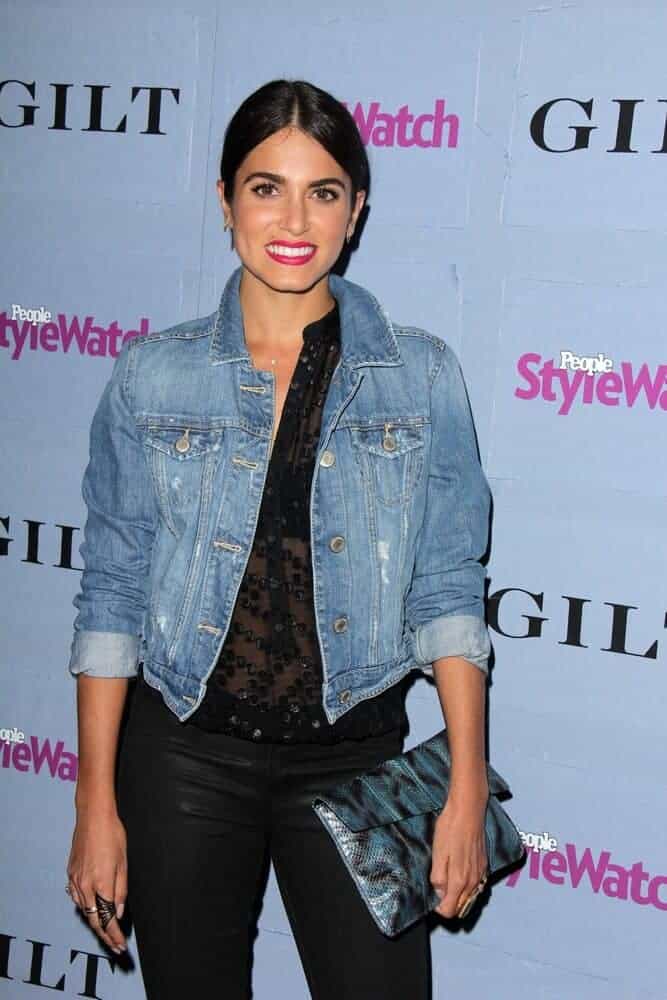 Nikki Reed matched her denim jacket with a straight, low ponytail during the People Stylewatch Hollywood Denim Party at Palihouse on September 19, 2013.