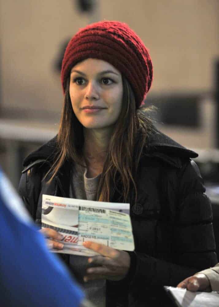 Rachel Bilson sporting a hipster look with her messy, long hair and a beanie as seen at LAX, February 19, 2010 in Los Angeles, California.