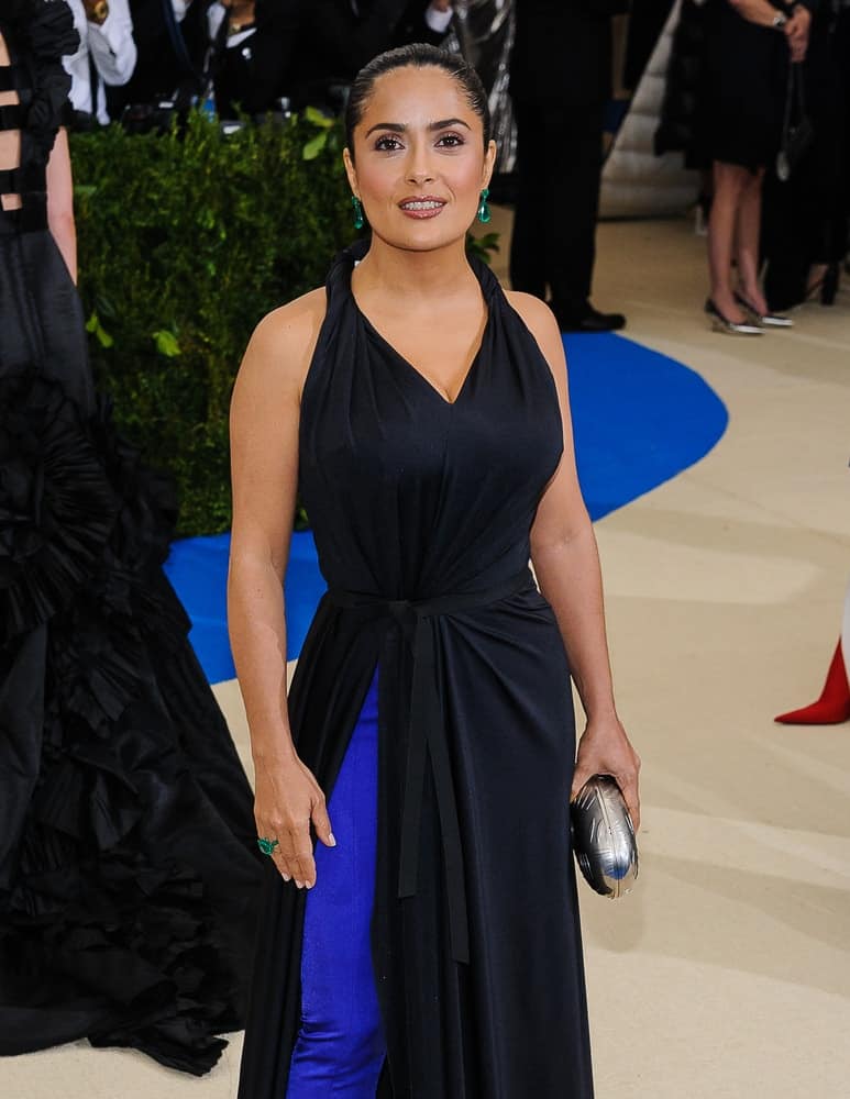 Salma Hayek attended the 2017 Metropolitan Museum of Art Costume Institute Gala at the Metropolitan Museum of Art in New York held last May 1, 2017. She was wearing a sexy black dress matched with her elegant and slick upstyle.
