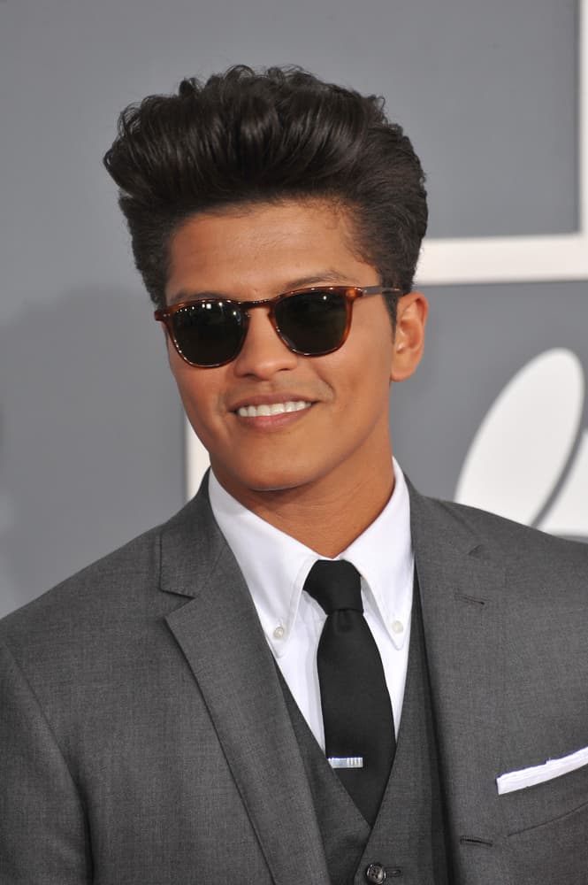 Bruno Mars with his famous pompadour hairstyle